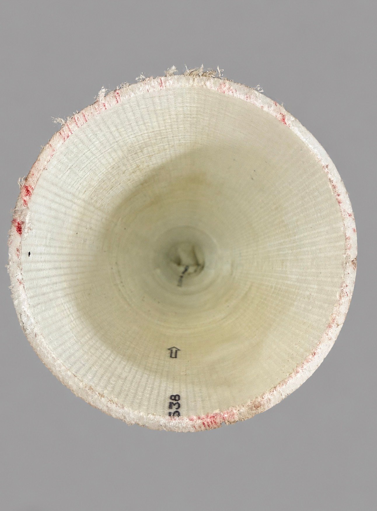 End-on view into CIPP liner tube showing concentric woven felt layers and diameter marking