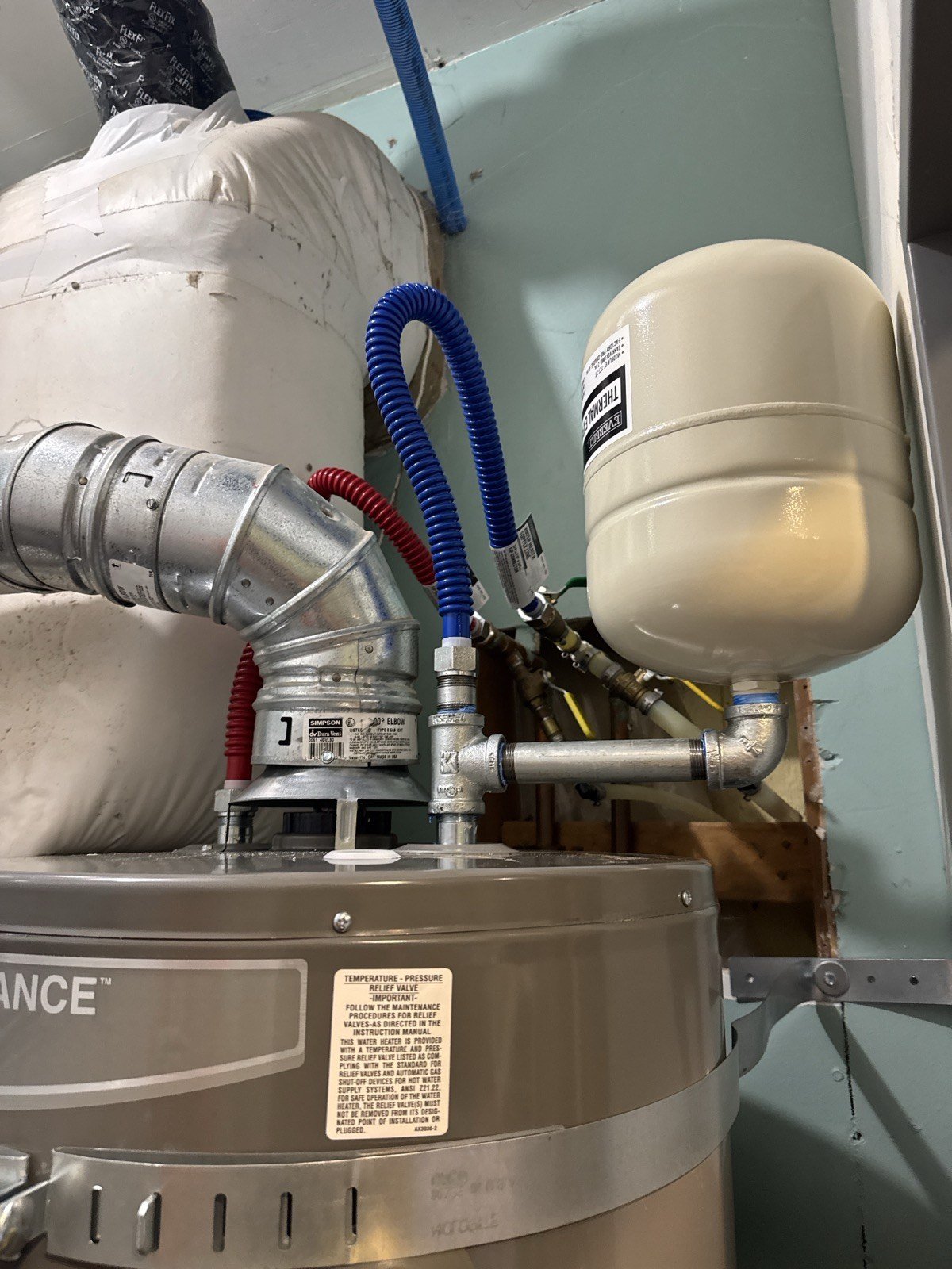 Water heater expansion tank and new braided supply lines installed in Newberg, Oregon by True Flow Plumbing PDX