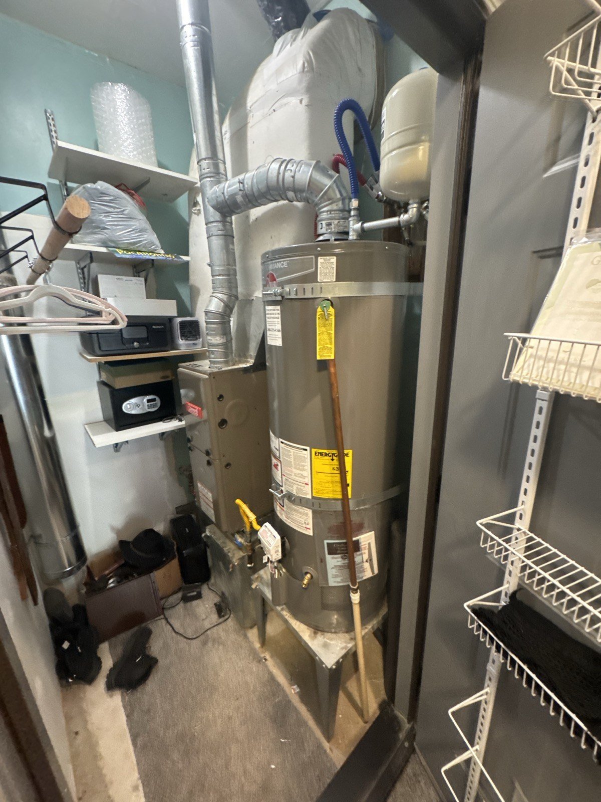 Gas water heater installation with seismic strapping and B-vent in Newberg, Oregon by True Flow Plumbing PDX